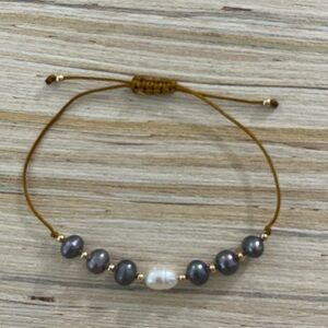 Handmade freshwater pearl bracelet one size and stainless steel gold .